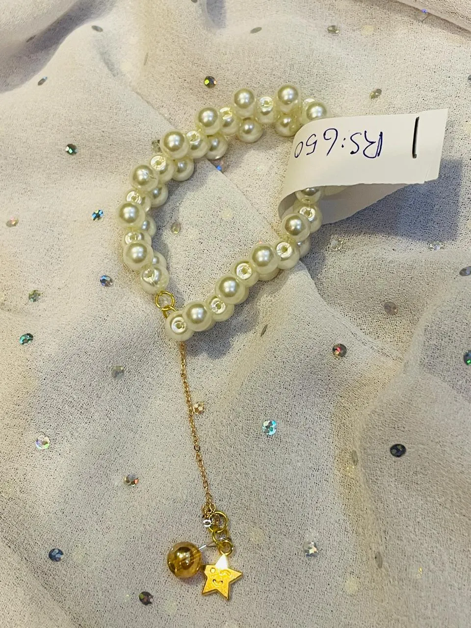 Pearl criss cross bracelet